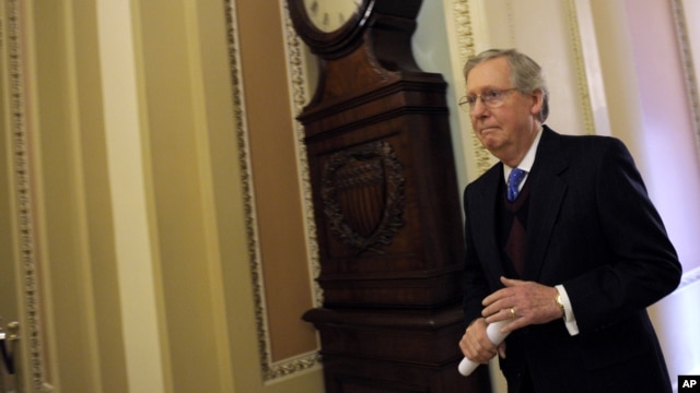 Senate Minority Leader Mitch McConnell of Ky. walks to the Senate floor on Capitol Hill in Washington, Thursday, Dec. 27, 2012.