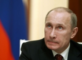 Russia's President Vladimir Putin looks on during a news conference at the Kremlin in Moscow, November 8, 2012.
