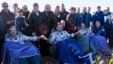 Phi hành gia Mỹ Thomas Marshburn (phải), phi hành gia người Nga Roman Romanenko, (giữa) và phi hành gia Canada Chris Hadfield trở về trái đất sau chuyến công tác kéo dài 146 ngày trên Trạm Không gian Quốc tế, ngày 14/5/2013.