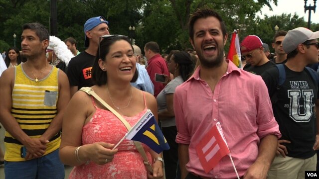 People celebrate Supreme Court ruling on Same Sex Marriage in front of the Supreme Court in Washington, D.C., June 26, 2015. (Photo: M. Burke / VOA)
