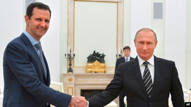 Tổng thống Syria Bashar al-Assad và Tổng thống Nga Vladimir Putin tại Điện Kremlin ở Moscow, ngày 20/10/2015.