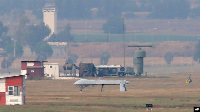 An unmanned aerial vehicle maneuvers on the runway after it landed at the Incirlik Air Base, on the outskirts of the city of Adana, southern Turkey, July 30, 2015.  