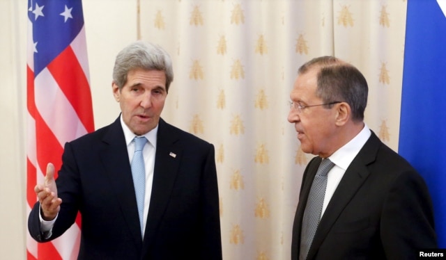 U.S. Secretary of State John Kerry (L) talks to Russian Foreign Minister Sergei Lavrov ahead of a meeting in Moscow, Russia, Dec. 15, 2015.