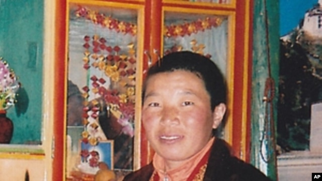 Tibetan nun Palden Chetso who died after setting herself on fire in southwestern China is seen in this undated file photo.