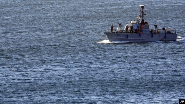 An Israeli military naval ship patrols inside the port of Ashdod, in the Mediterranean Sea, Israel, March 15, 2011.