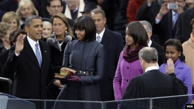 President Barack Obama receives the oath of office from Chief Justice John Roberts at the ceremonial swearing-in at the U.S. Capitol during the 57th Presidential Inauguration in Washington, Monday, Jan. 21, 2013. 