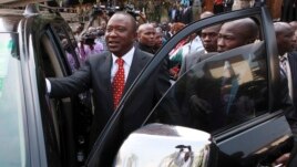 Kenya's Deputy Prime Minister Uhuru Kenyatta leaves after he was cleared by the Independent Electoral and Boundaries Commission to run for presidency in the March 4 presidential elections, in capital Nairobi, Kenya, Jan. 30, 2013.