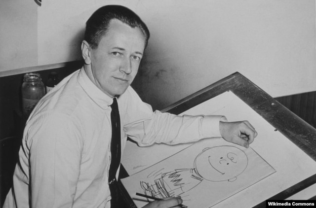 Charles Schulz in 1956 with his "Peanuts" creation, Charlie Brown