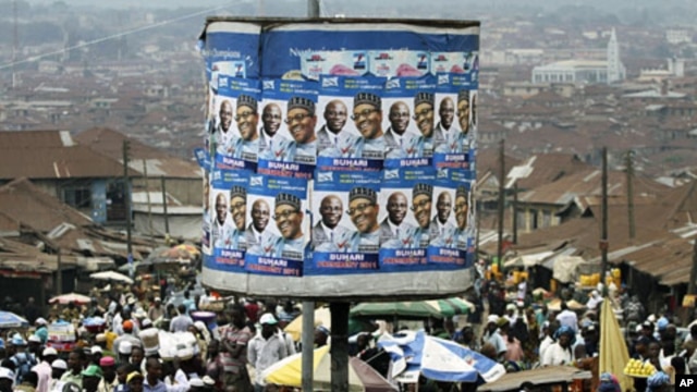 An advertisement tank is plastered with posters of former military ruler Muhammadu Buhari and his running mate Tunde Bakare during the Congress for Progressive Change (CPC) presidential campaign rally at Mapo square, Ibadan, south-west Nigeria,  Mar 14 20