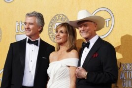 Actors Patrick Duffy (L), Linda Gray and Larry Hagman from the TV series "Dallas" pose backstage at the 18th annual Screen Actors Guild Awards in Los Angeles, California, January 29, 2012.