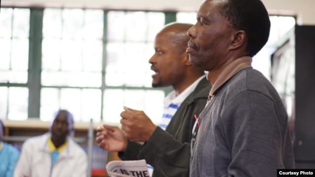 Fusi Mofokeng and Tshokolo Mokoena speak to South African students shortly after their release from prison for a crime they say they did not commit, January 2013. (Wits Justice Project) 