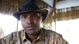 Indicted war criminal   Bosco Ntaganda poses for a photograph during an interview in Goma, Democratic Republic of Congo, October 2010. 