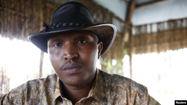 Indicted war criminal Bosco Ntaganda poses for a photograph during an interview with Reuters in Goma, Democratic Republic of Congo in 2010.