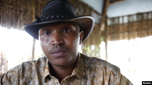Indicted war criminal Bosco Ntaganda poses for a photograph during an interview in Goma, Democratic Republic of Congo, October 2010. 