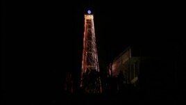 A 30-meter-tall (100-foot-tall) steel Christmas tree with about 30,000 light bulbs, is lit by Christian groups at the western mountain peak, known as Aegibong, in Gimpo, South Korea, December 22, 2012. 