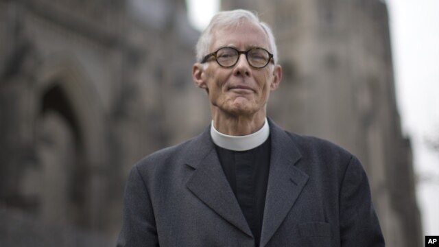Rev. Gary Hall, dean of the Washington National Cathedral, stands outside the church in Washington, Wednesday, Jan. 9, 2013. 
