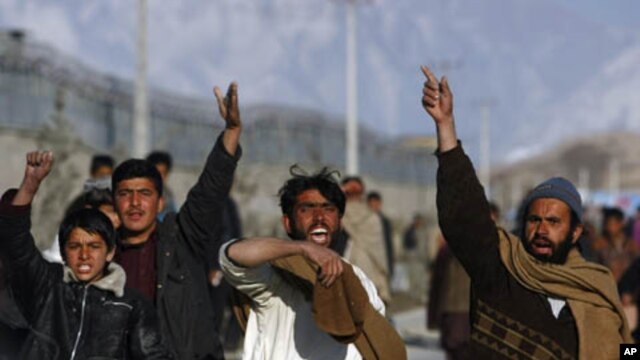 Afghan protesters shout anti-U.S. slogans during a protest over the burning of Qurans by NATO in Kabul, Afghanistan, February 24, 2012.