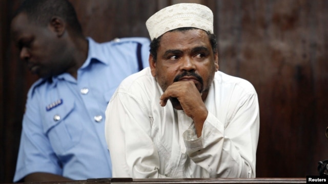 Aboud Rogo Mohammed stands inside the dock at a Law Court in  Nairobi, December 22, 2010.  