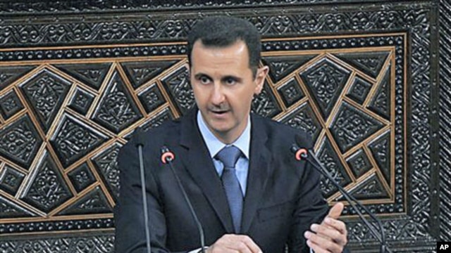Syrian President Bashar al-Assad addresses the nation during a speech at the Parliament in Damascus, Syria, March 30, 2011