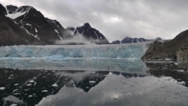 Glaciers on western Svalbard have been retreating for at least the past 100 years. The lake in the foreground can be used to study past changes in glacier activity. (Credit: William D'Andrea)
