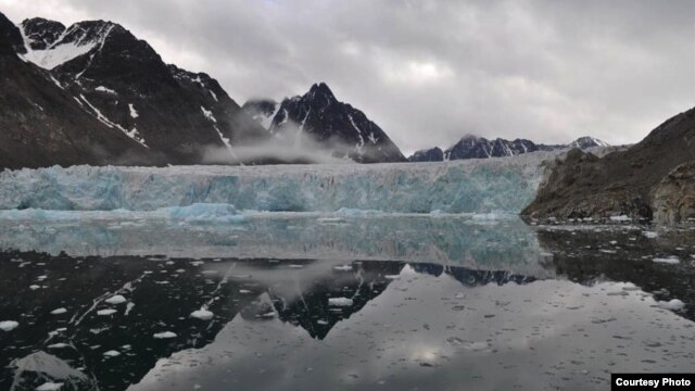Glaciers on western Svalbard have been retreating for at least the past 100 years. The lake in the foreground can be used to study past changes in glacier activity. (Credit: William D'Andrea)