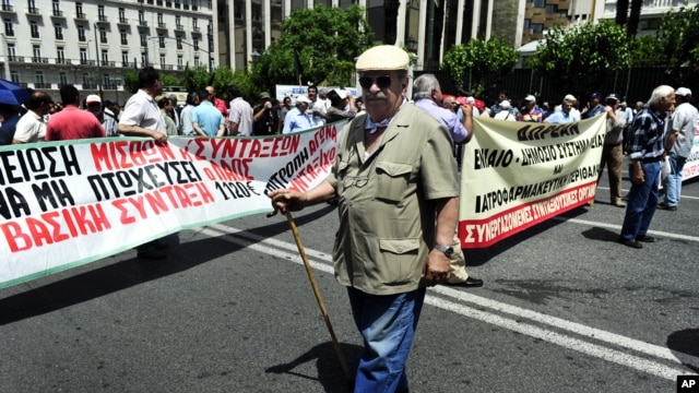 A pensioner joins a demonstration against new austerity measures in Athens June 9, 2011