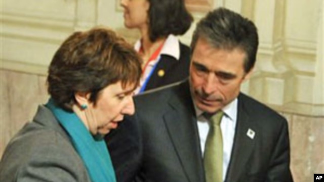 European Union foreign policy chief Catherine Ashton and NATO Secretary-General Anders Fogh Rasmussen during the informal meeting of EU Defense Ministers in Godollo, Hungary,  February 25, 2011