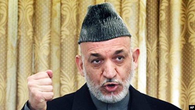 Afghan President Hamid Karzai speaks during a press conference in Kabul, February 08, 2011