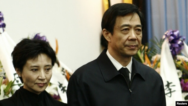 China's former Chongqing Municipality Communist Party Secretary Bo Xilai (R) and his wife Gu Kailai.