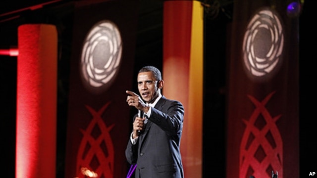 President Barack Obama speaks at a luau and entertainment portion of the leaders dinner at the APEC Summit in Honolulu, Hawaii, November 12, 2011.