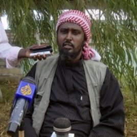 Al-Shabab spokesperson Ali Mohamud Rage holds a news conference in Mogadishu, Somalia, threatening Kenya, October 17, 2011.