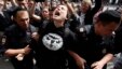 Russian police detain a gay rights activist during a rally outside the Duma, the lower house of Parliament, in Moscow, May 25, 2013. 