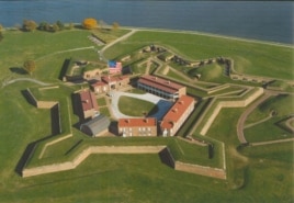 An aerial view of Fort McHenry. The 15-star flag shown is current, but it approximates the oversized flag that flew over the fort during the fateful bombardment of 1814. (National Park Service)