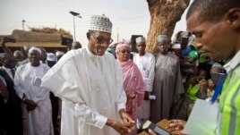 Presidential candidate Muhammadu Buhari prepares to vote in Nigeria's presidential election.