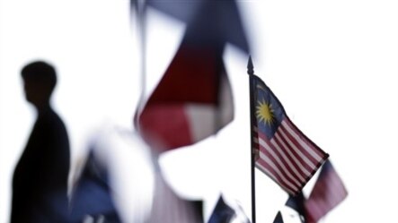 A Malaysian flag among other flags at the Trans-Pacific Partnership Free Trade Agreement talks, San Diego, July 10, 2012.