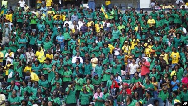 African National Congress supporters cheer before the start of their party's 100th anniversary celebrations in Bloemfontein, South Africa, January 8, 2012.