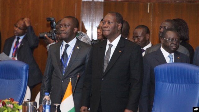 Ivory Coast President Alassane Quattara (r) is Chairman of ECOWAS Authority of Heads of State and Government.