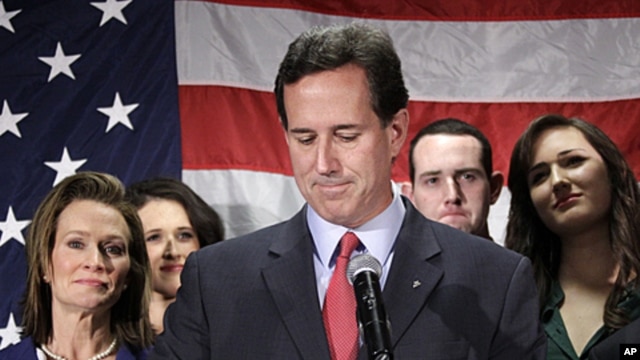 Surrounded by members of his family Republican presidential candidate, former Pennsylvania Sen. Rick Santorum announces he is suspending his candidacy effective today in Gettysburg, Pennsylvania,  April 10, 2012.