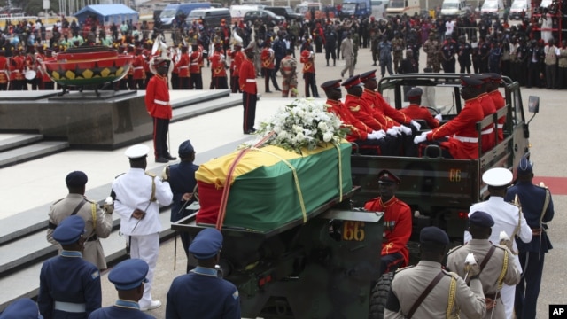 The coffin of the late Ghanaian President John Atta Mills is transported in Accra, Ghana, August 10, 2012.