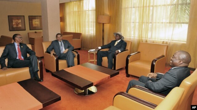 Rwanda President Paul Kagame, left, Tanzania President Jakaya Kikwete, Uganda President Yoweri Museveni, and DRC President Joseph Kabila, at the opening of the International Great Lakes Conference, Aug. 7, 2012