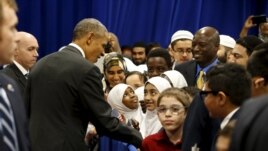 Obama visited Baltimore with the presence of the Islamic Association of Muslim handshake