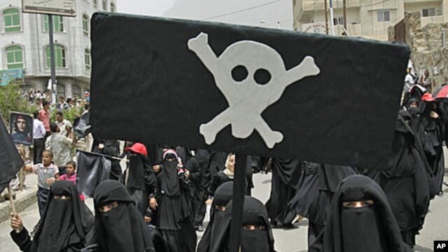 Women march during a demonstration in the southern city of Taiz demanding the ouster of Yemen's President Ali Abdullah Saleh, July 17, 2011