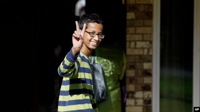 Ahmed Mohamed, 14, gestures as he arrives to his family's home in Irving, Texas, Sept. 17, 2015.