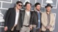 From left, Marcus Mumford, Ben Lovett, Country Winston and Ted Dwane, of musical group Mumford &amp; Sons, arrive at the 55th annual Grammy Awards in Los Angeles, Feb. 10, 2013. 