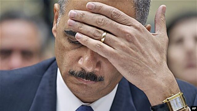 Attorney General Eric Holder testifies before the House Oversight and Government Reform Committee hearing entitled 'Fast & Furious: Management Failures at the Department of Justice,' on Capitol Hill in Washington, February 2, 2012.