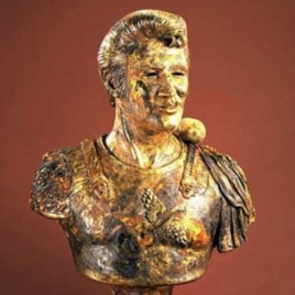 This ceramic bust by Robert Arneson features a rock on Elvis' shoulder, a reference to the entertainer's status as the ''King of Rock'.