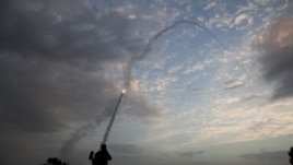 An Iron drome missile is launched from Tel Aviv to intercept a rocket fired from Gaza, Nov. 17, 2012.