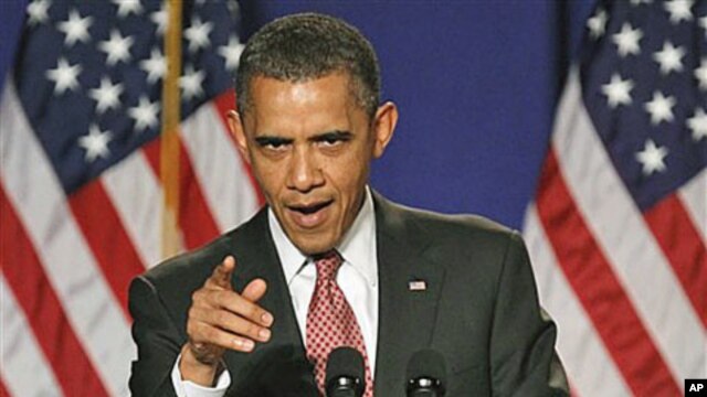 President Barack Obama gestures while speaking in Alexandria, Virginia, September 16, 2011