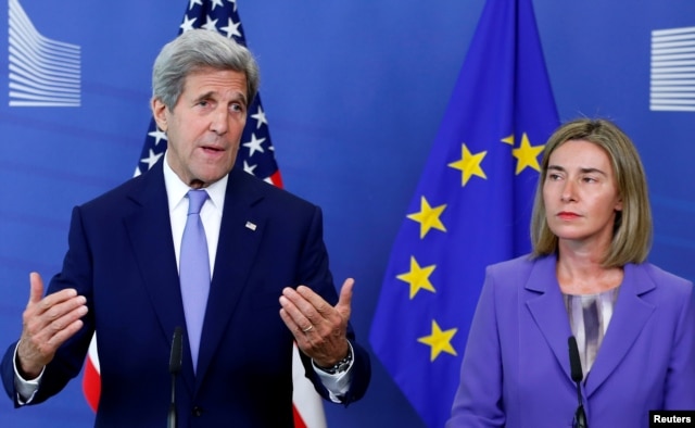 U.S. Secretary of State John Kerry and European Union foreign policy chief Federica Mogherini (R) address a joint news conference after their meeting at the EU Commission headquarters in Brussels, Belgium, June 27, 2016.