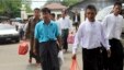 Burmese political prisoners who were released from Insein prison walk away from the facility, May 17, 2013 in Rangoon. 
